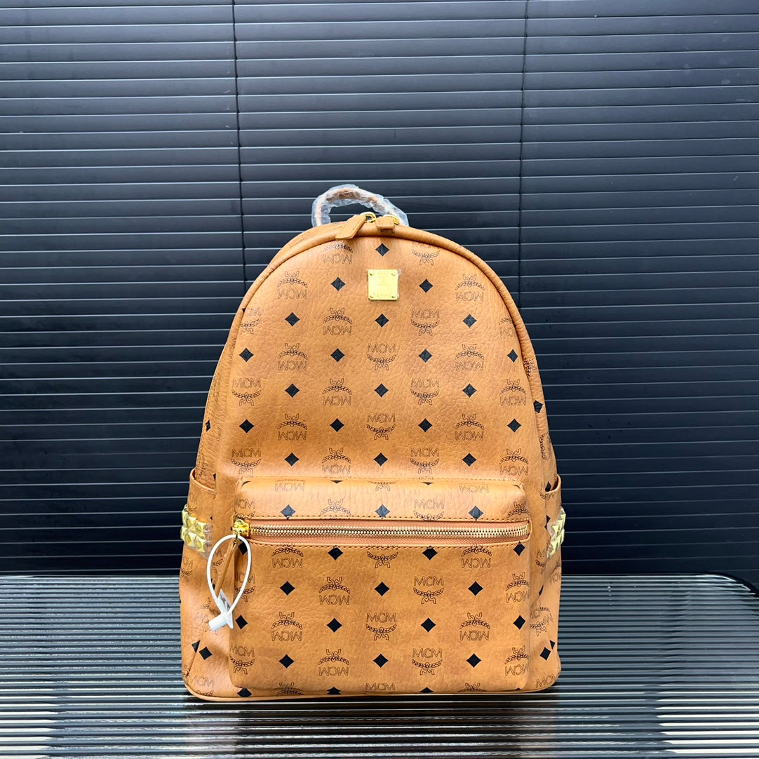McM Stark Visetos Oversized Backpack | 2K Gold-Plated Rivets & Vintage Monogram Coated Canvas | Unisex Cognac Brown | 40CM Luxury Travel Bag