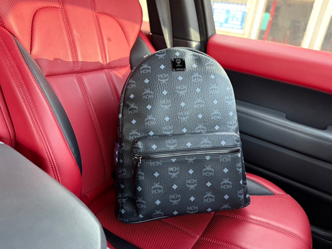 McM Stark Visetos Oversized Backpack | 2K Gold-Plated Rivets & Vintage Monogram Coated Canvas | Unisex Cognac Brown | 40CM Luxury Travel Bag