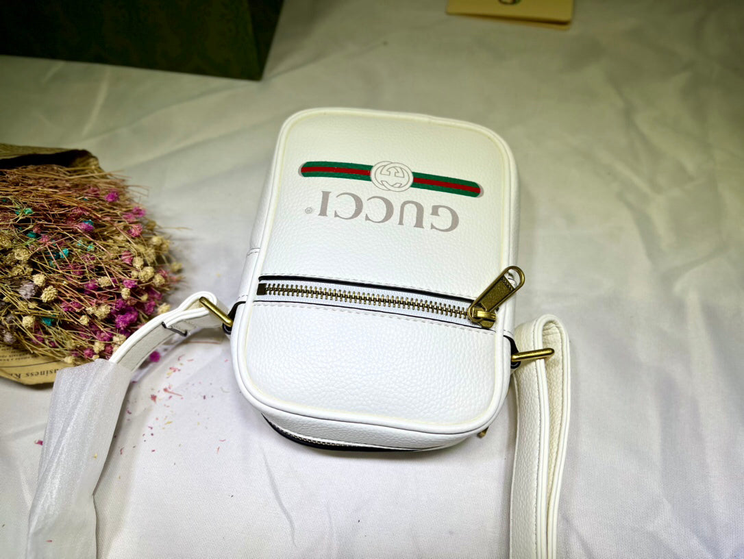 GUCCI Men's Vintage Logo Print Crossbody Bag | Textured Leather Mini Document Holder | 1980s Inspired