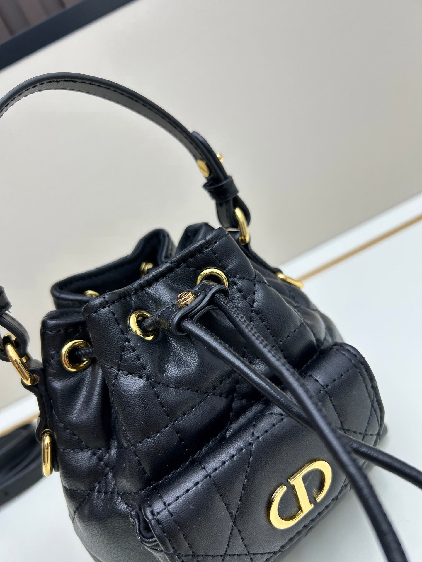 Dior Caro Black Lambskin Bucket Bag with Cannage Stitch & Drawstring | 2025 Fall Ready-to-Wear Collection | Detachable Handle & Adjustable Strap
