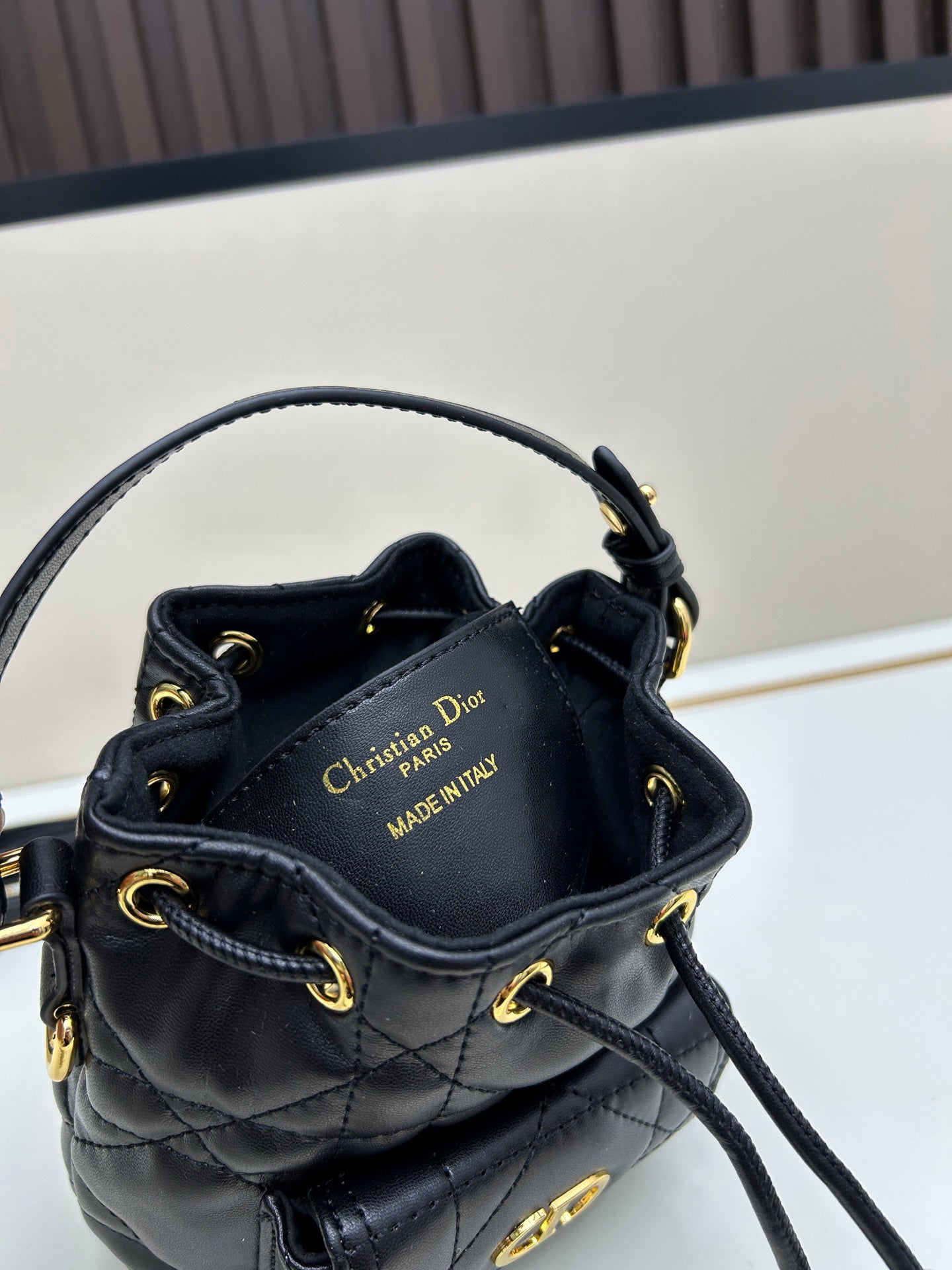 Dior Caro Black Lambskin Bucket Bag with Cannage Stitch & Drawstring | 2025 Fall Ready-to-Wear Collection | Detachable Handle & Adjustable Strap