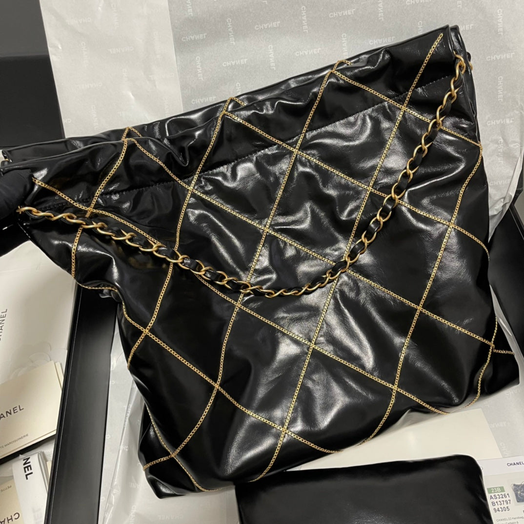 Chanel 22 Bag "Trash Bag" Black & Gold | Vintage Coin Detailing & Magnetic Closure | Unisex Calfskin Luxury Tote