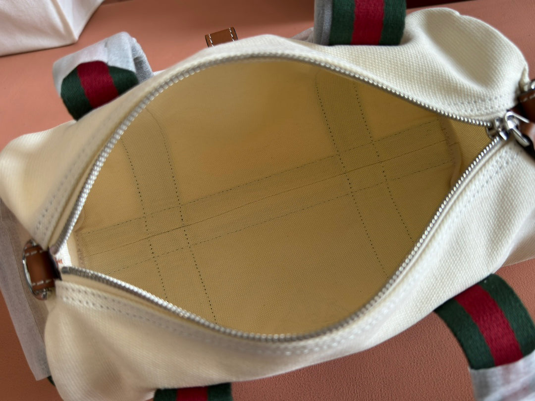 Gucci Spring Summer 2025 Men's Canvas Travel Bag | Navy Leather Trim Red-Green Web Strap Made in Italy Emblem