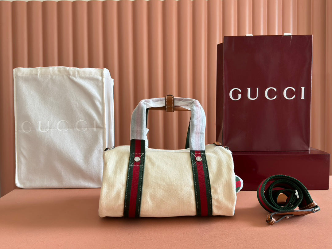 Gucci Spring Summer 2025 Men's Canvas Travel Bag | Navy Leather Trim Red-Green Web Strap Made in Italy Emblem