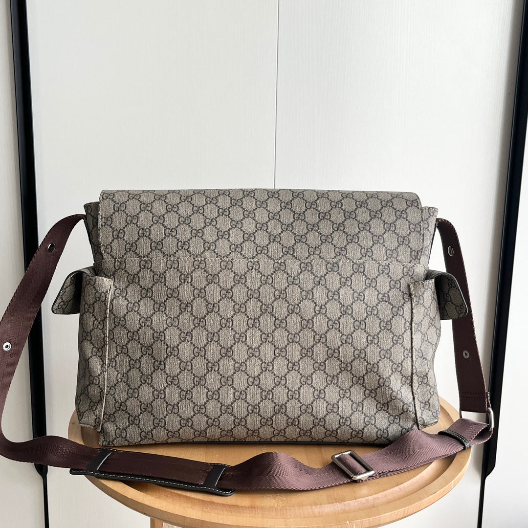 Gucci Luxury Diaper Bag – 44×28×14cm Spacious Tote with Side Pockets Foldable Mat & Adjustable Strap Unisex Design