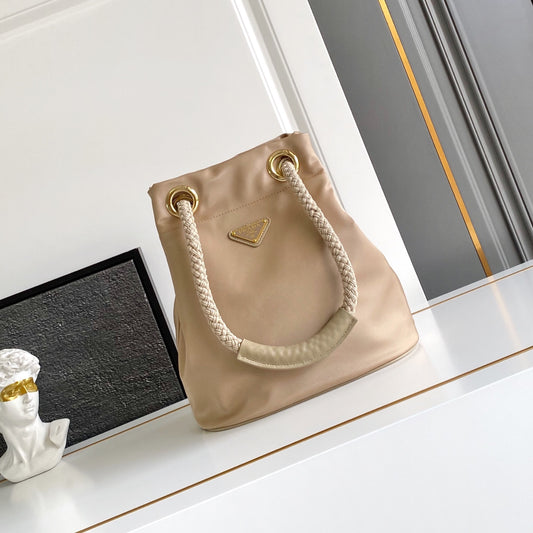 2025 Runway Recycled Nylon Bucket Bag 23.5x28x16.5cm - Slide Rope Handle & Enamel Triangle | Tote to Shoulder Convertible