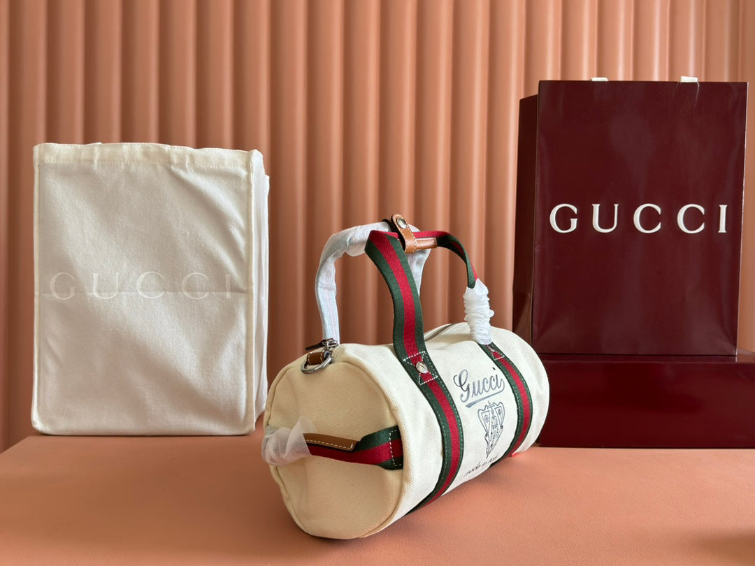 Gucci Spring Summer 2025 Men's Canvas Travel Bag | Navy Leather Trim Red-Green Web Strap Made in Italy Emblem