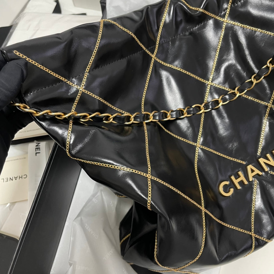 Chanel 22 Bag "Trash Bag" Black & Gold | Vintage Coin Detailing & Magnetic Closure | Unisex Calfskin Luxury Tote