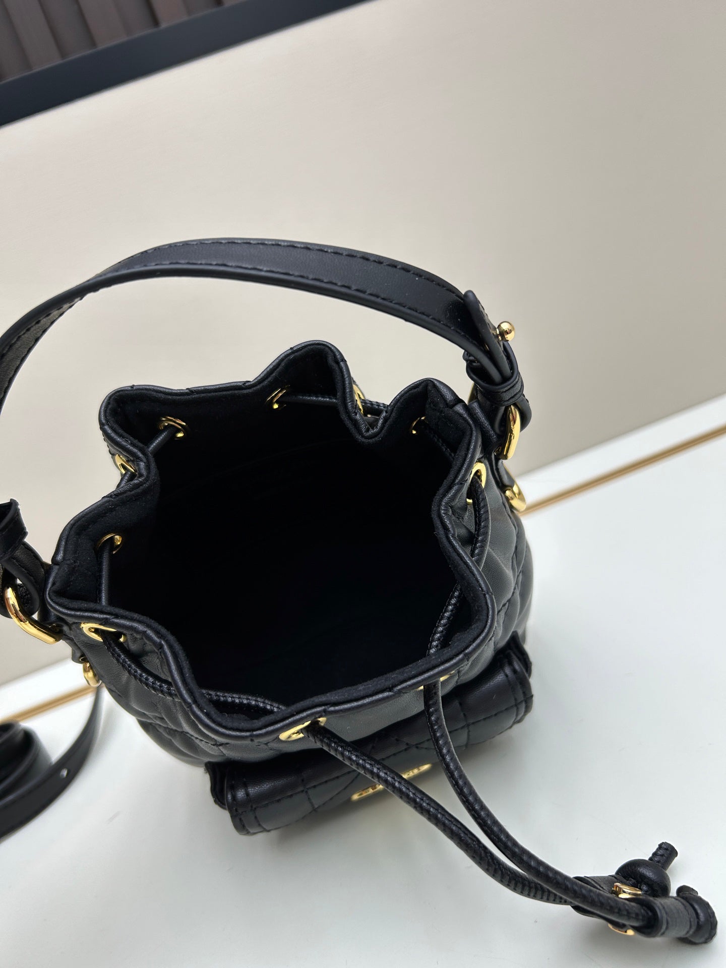 Dior Caro Black Lambskin Bucket Bag with Cannage Stitch & Drawstring | 2025 Fall Ready-to-Wear Collection | Detachable Handle & Adjustable Strap