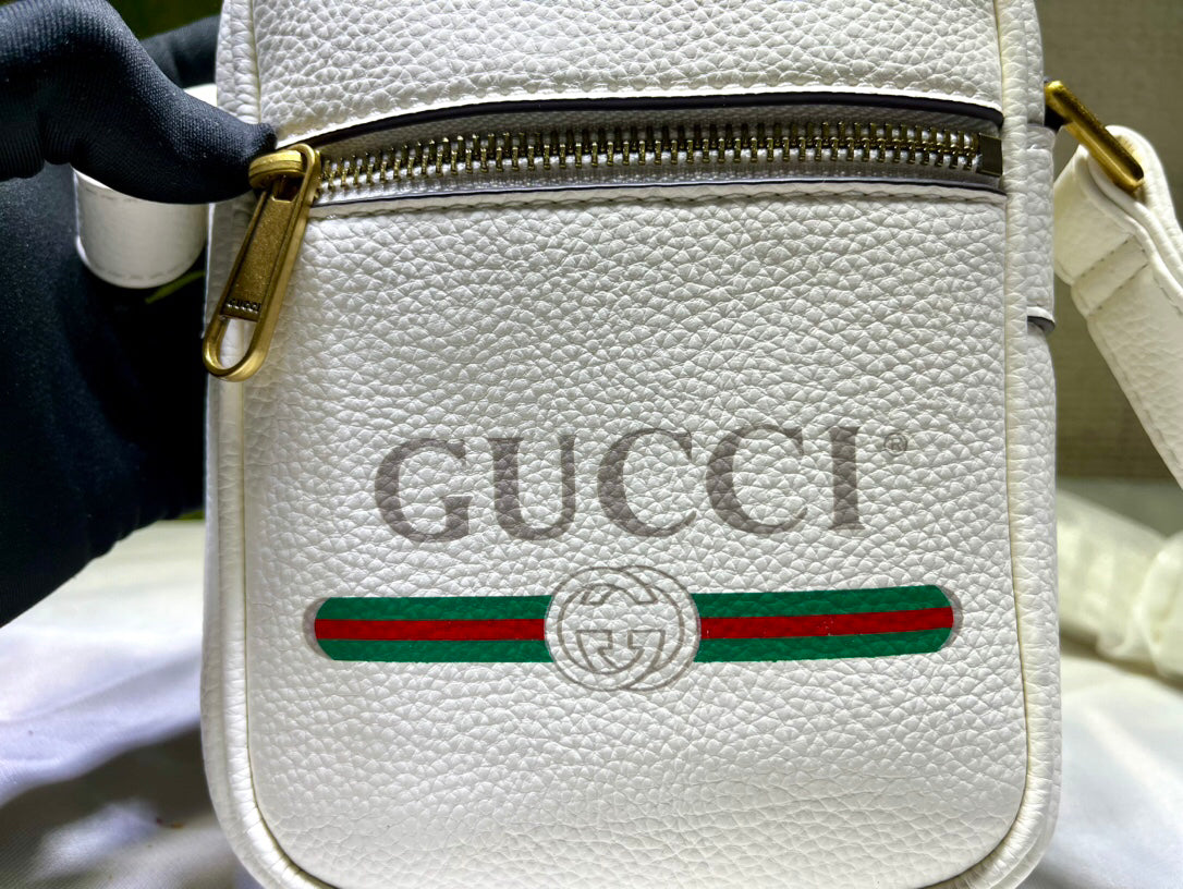 GUCCI Men's Vintage Logo Print Crossbody Bag | Textured Leather Mini Document Holder | 1980s Inspired