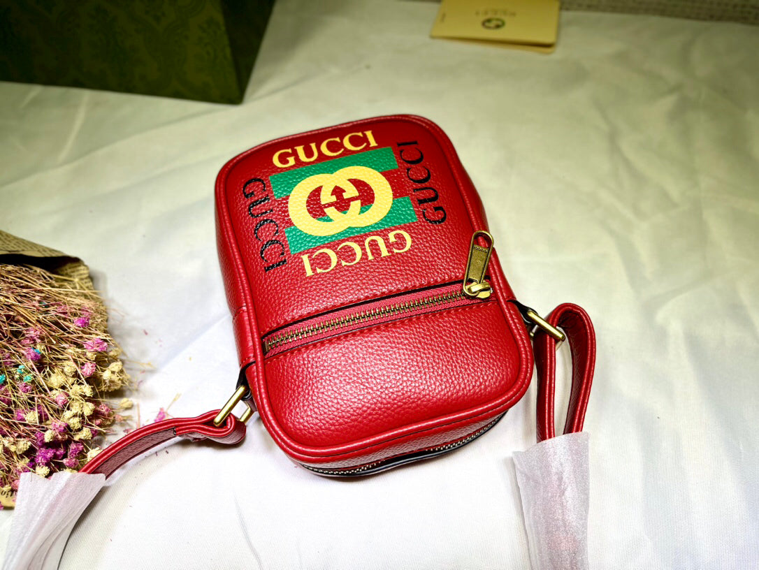 GUCCI Men's Vintage Logo Print Crossbody Bag | Mini Document Holder in Textured Leather